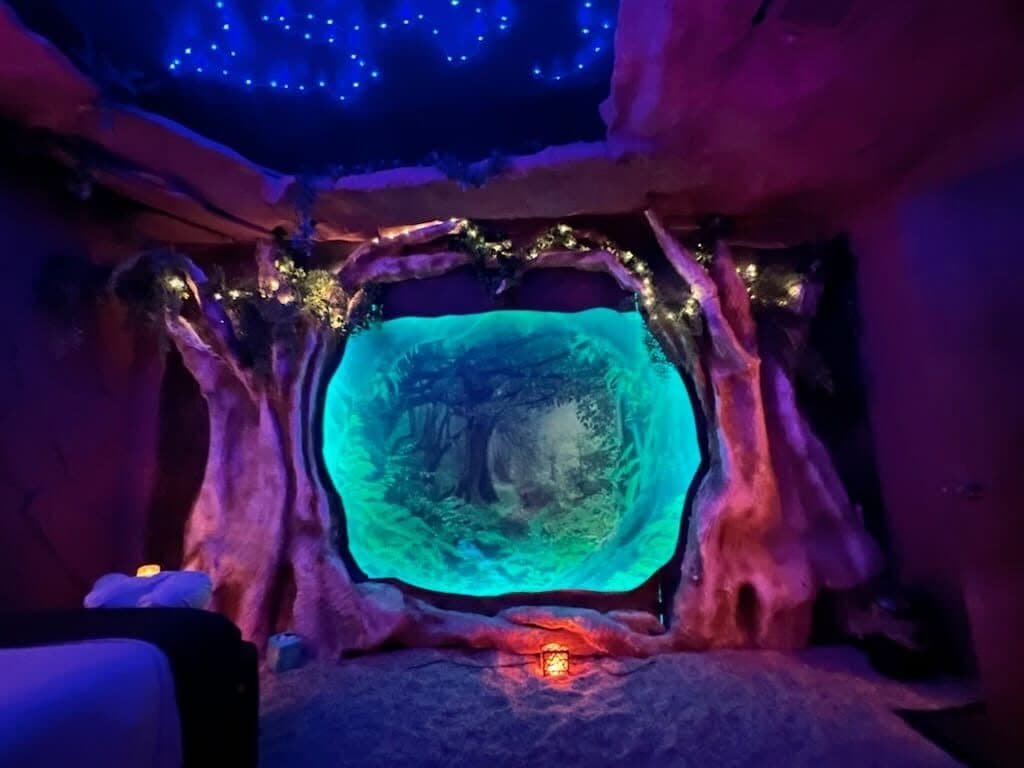 Zero-gravity chairs beneath the starlit ceiling of the salt cave